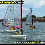 X3-sailing-dinghy-fleet-edge-racing-off-the-beach
